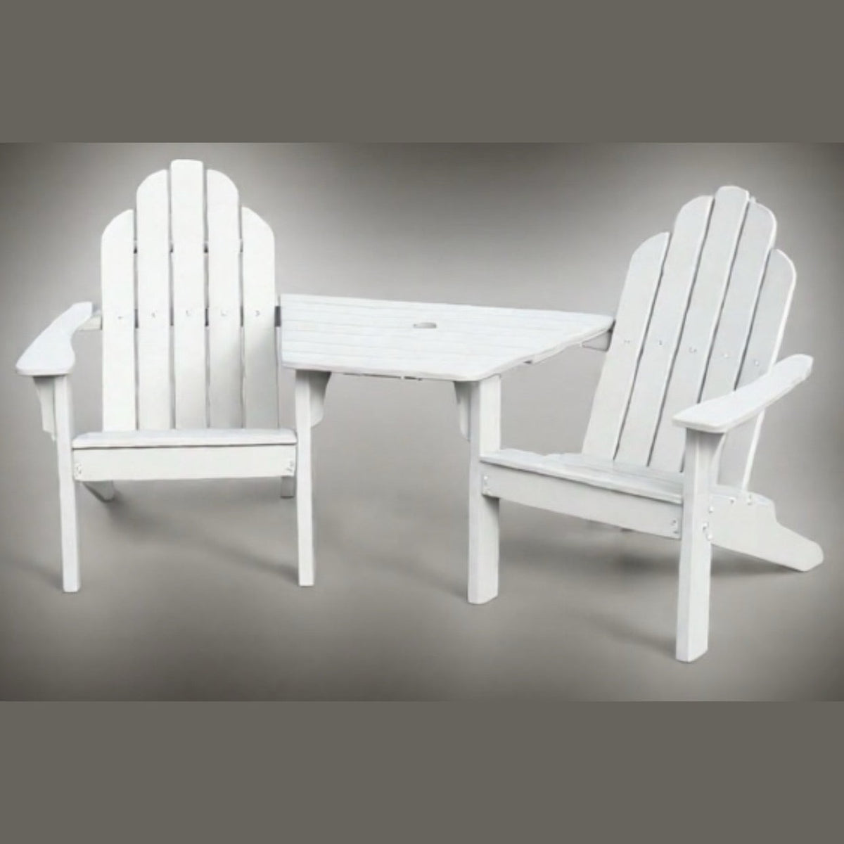 White Adirondack chair set with table on a gray background
