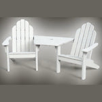 White Adirondack chair set with table on a gray background