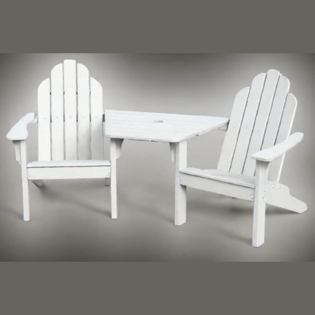 White Adirondack chair set with table on a gray background