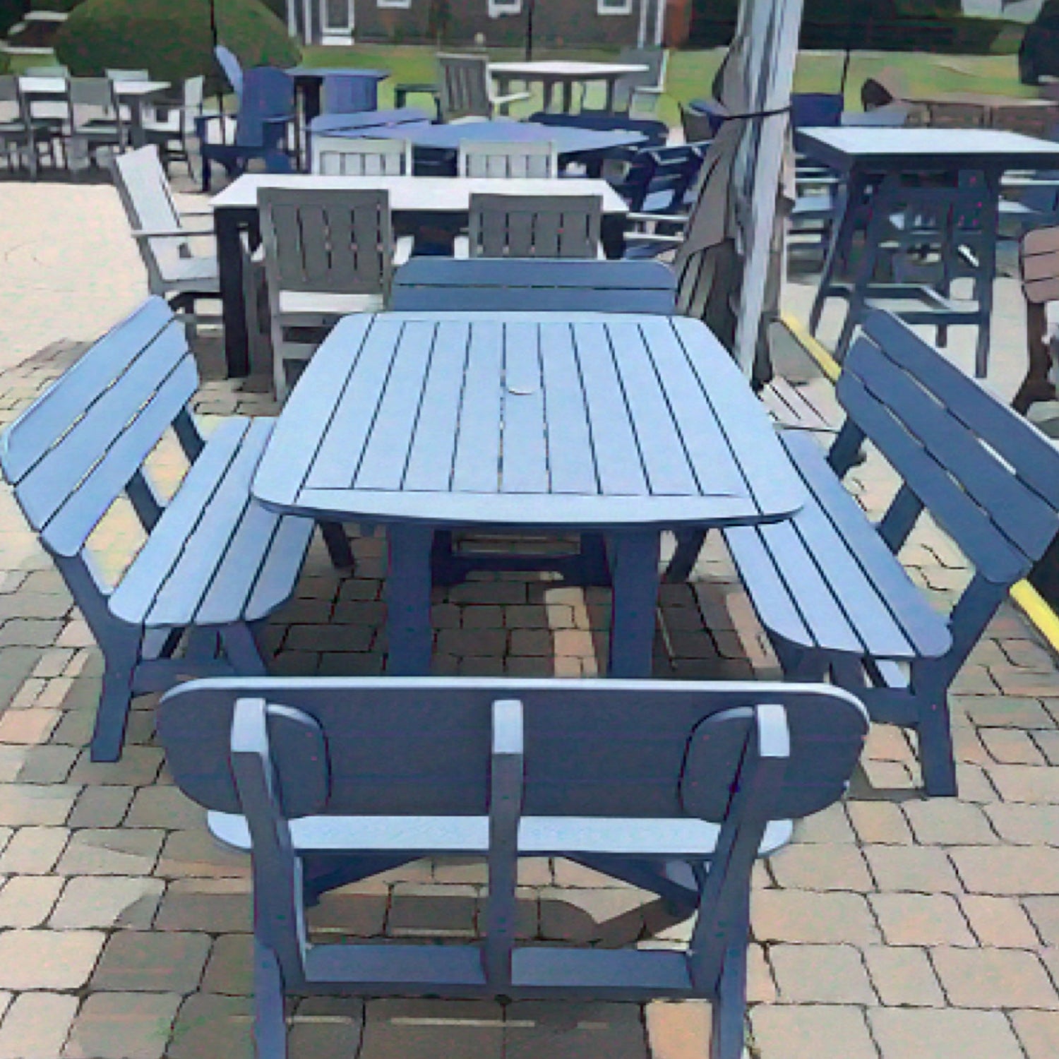 slate blue patio table rectangular with 4 benches around it. by seaside casual furniture of Rhode Island